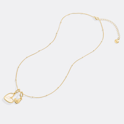 COLLIER INITIAL EN NACRE EN FORME DE CŒUR